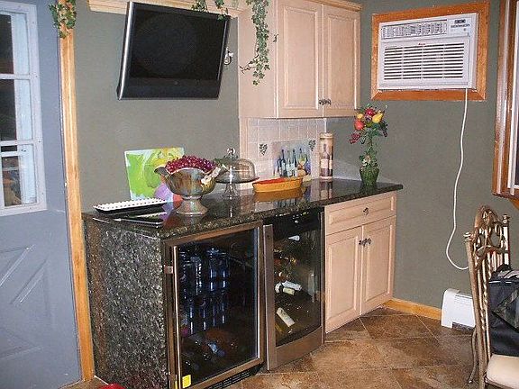 Custom Built Counter with Wine and bev refrigerator