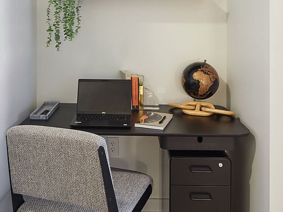 Desk with wood-style flooring.