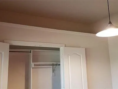 Bedroom #4 with extra storage above the closet.