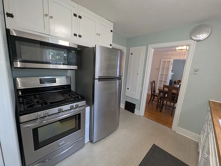 Gas range with built-in microwave that vents to the outside