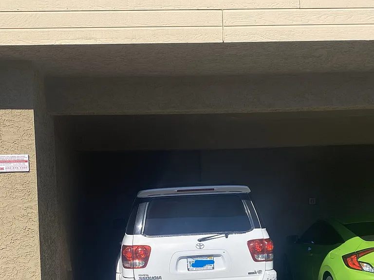 one covered parking spot and 1 uncovered parking spot. Plenty of guest parking, as well.