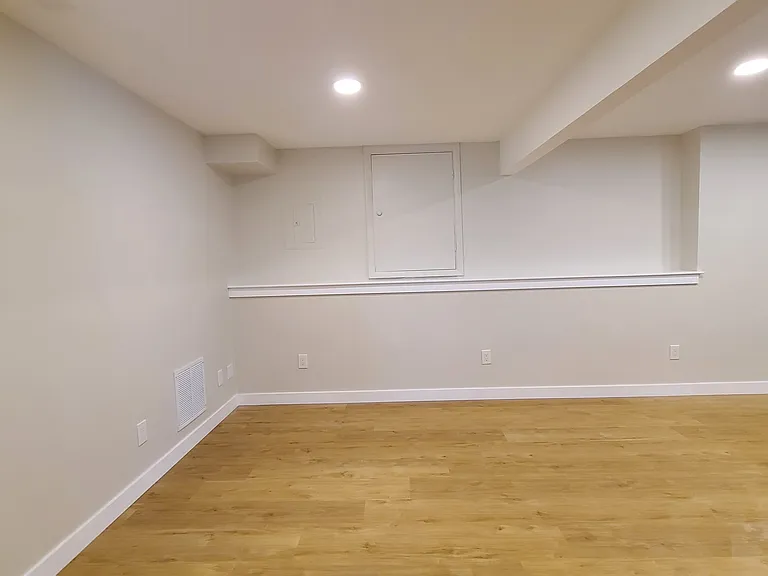 Living room, kitchen to the right of the photo
