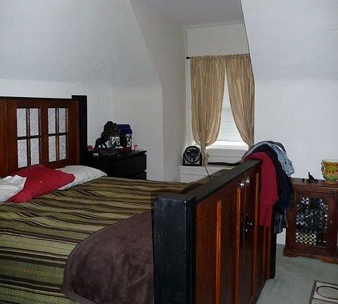 Bedroom with walk-in closet
