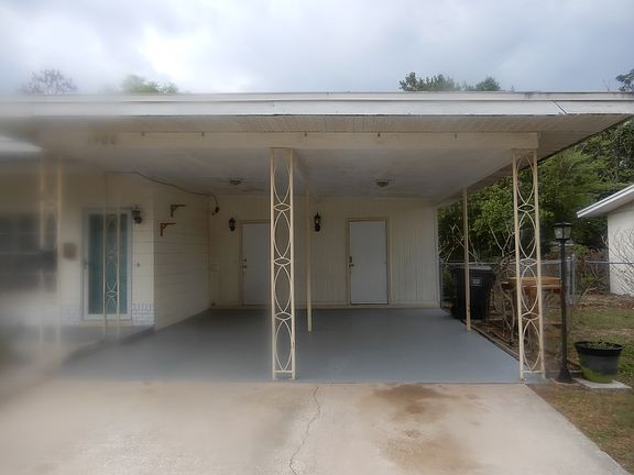 Double Carport with entrance to the inside kitchen and outside storage room
for bikes, lawn equipment, etc..