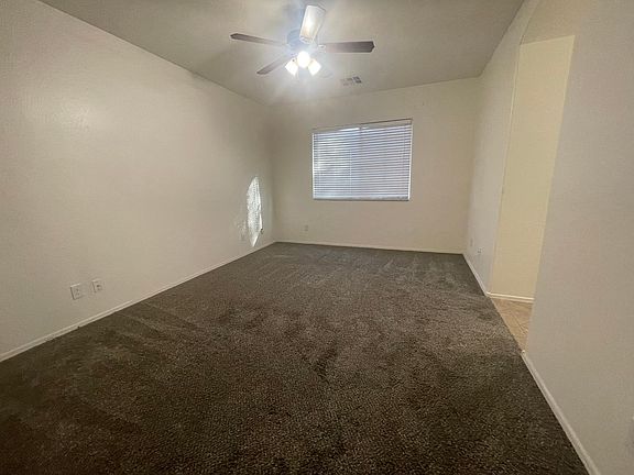 Enormous Master Bedroom with ceiling fan