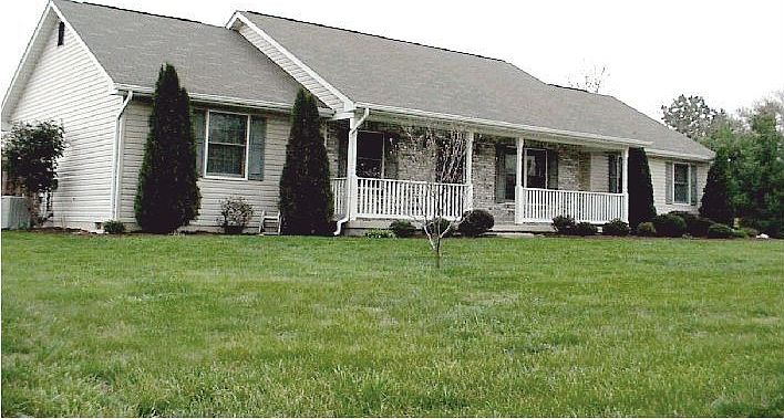 Front of home, lawn care since 1998