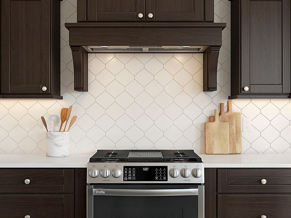 White hex tile backsplash in kitchen