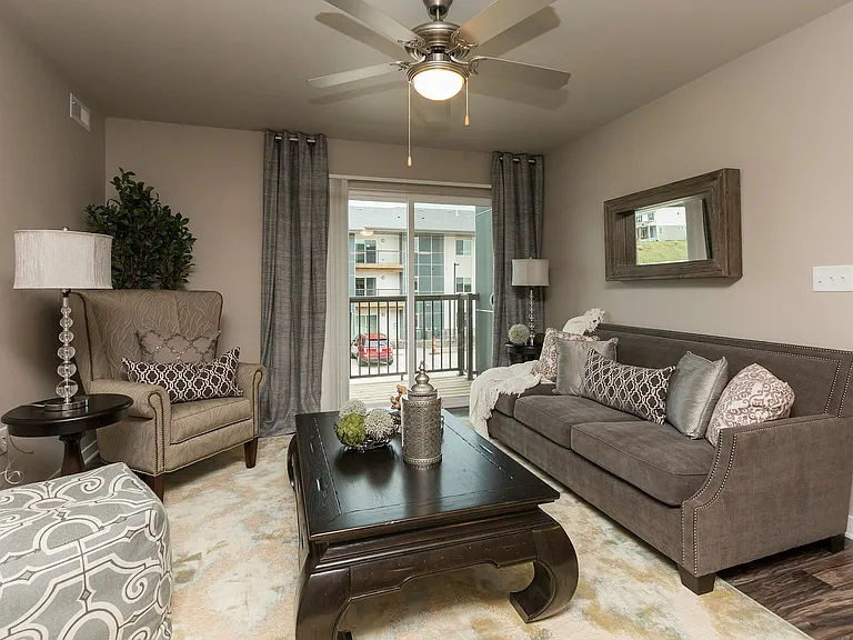 Bright and airy living spaces open directly to your private balcony_bringing in natural light and outdoor charm.
