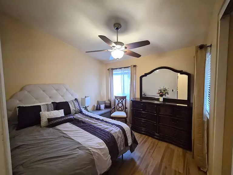Bedroom #2- Queen Bed. Laminate wood floor