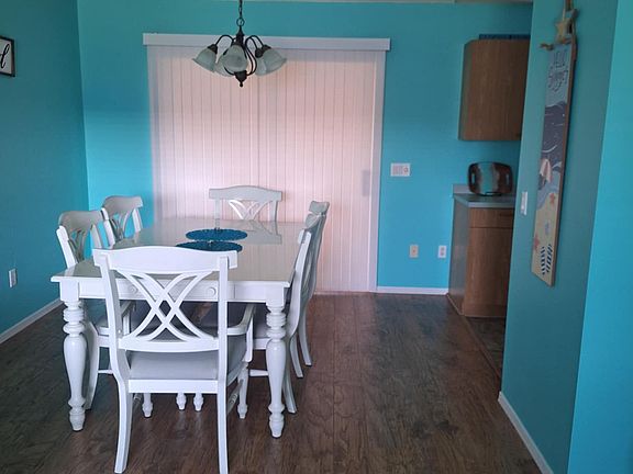 Dining area has a comfortable table for your meals.