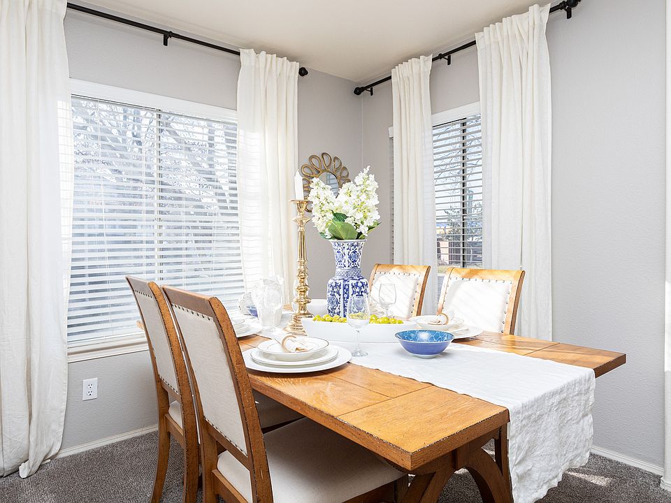 Enjoy meals in this bright and elegant dining space, designed for comfort and style.