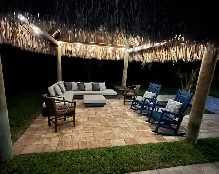 Outdoor seating area at night.
