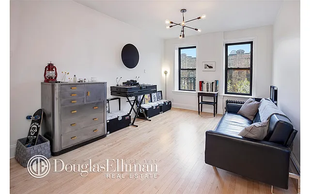 Sold by Douglas Elliman | media 12