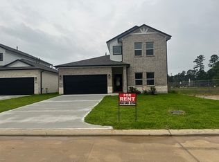 9711 Champion Heavens Dr, Spring, TX 77379