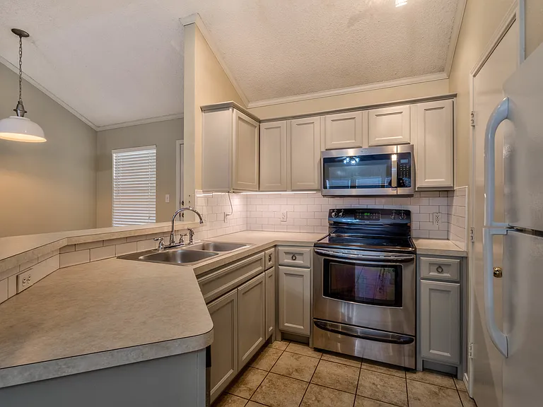 kitchen with new appliances, new custom-built lower cabinets