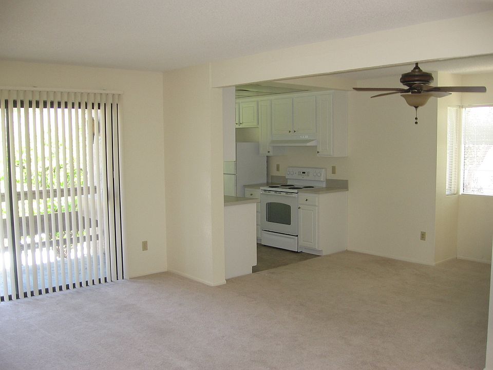 Living-dining room to kitchen- patio to the left
