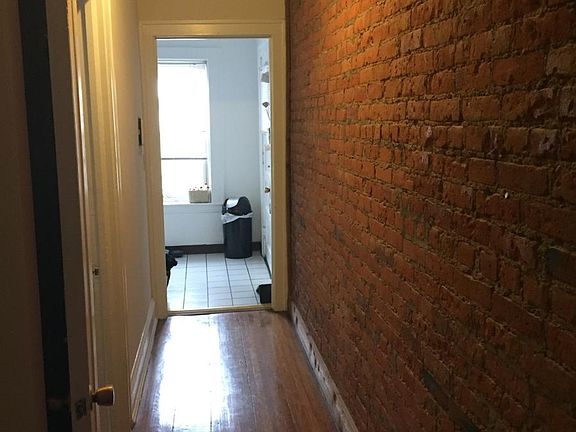 Exposed brick throughout the apartment