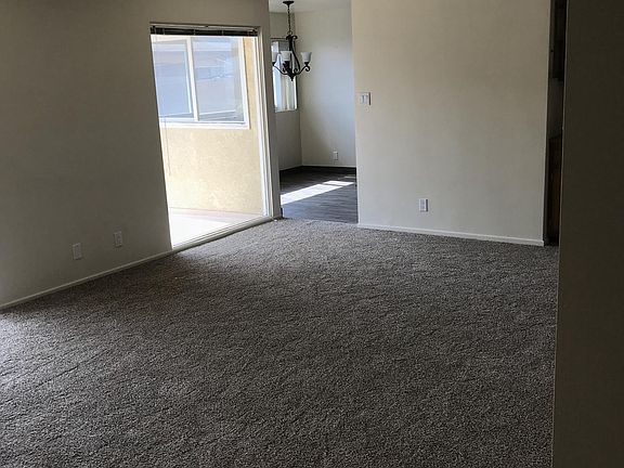 Living room looking toward kitchen/dining