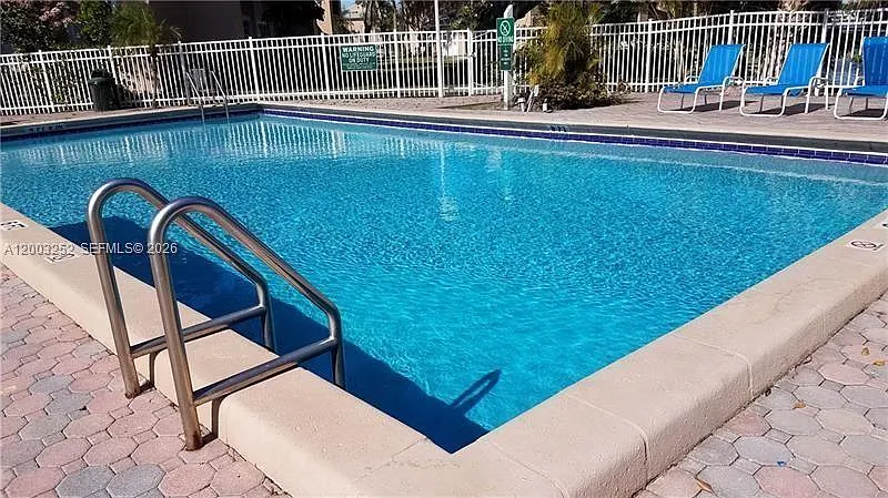 Photo 2 of 26 - 1701 NW 96th Ter #1E - Pembroke Pines, FL Building Photo - 1701 NW 96th Ter #1E