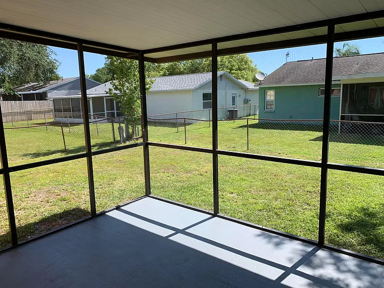 Screen in Patio and Fenced in Yard