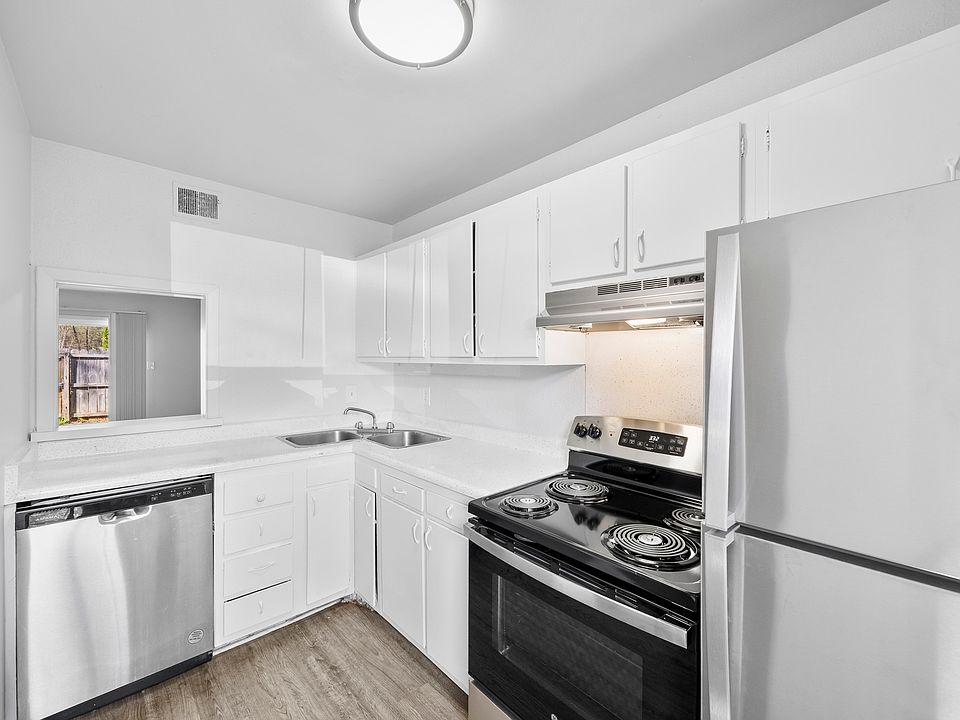 Bright kitchens with stainless steel appliances