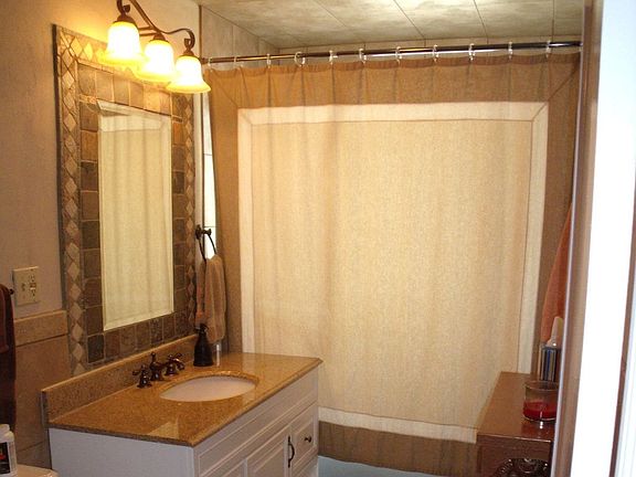Bath with custom tiles.