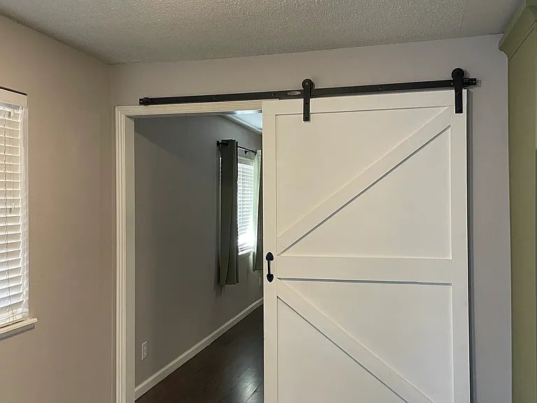 sliding barn door to living space 2.