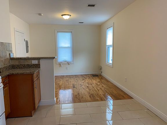 Kitchen looking into living room
