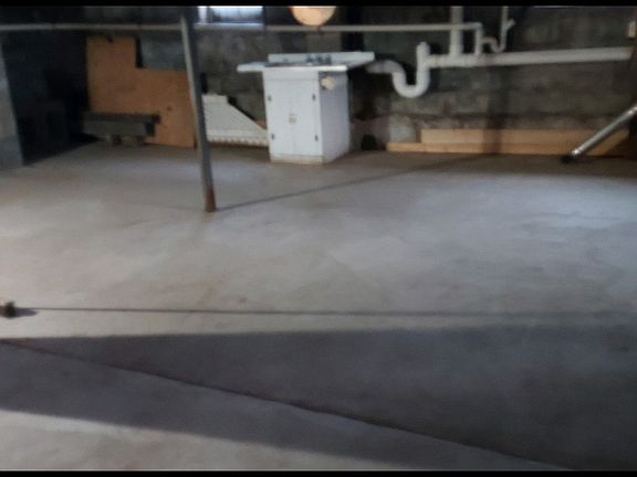 Basement with utility sink and washer and dryer hook ups