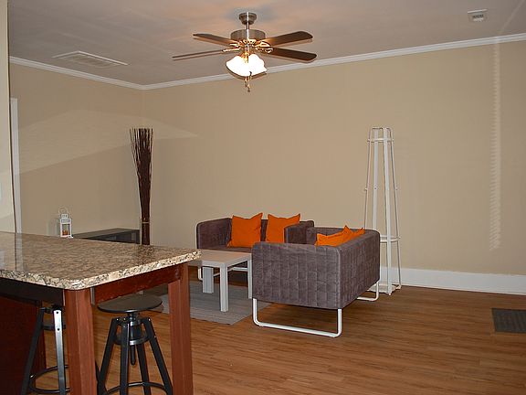 Living room and peninsula with seating