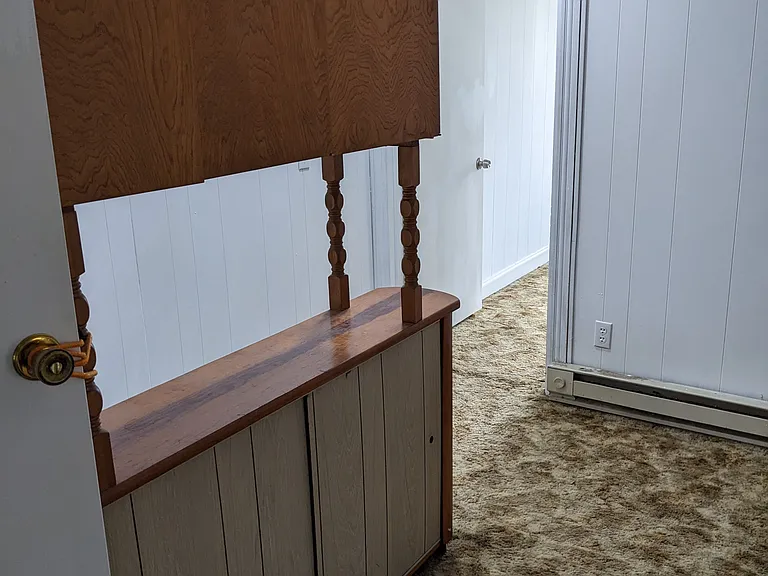 Third floor, office/playroom with a convenient half bathroom