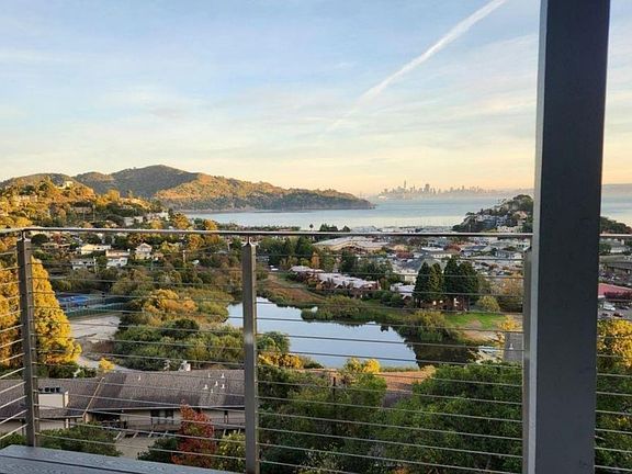 Step out on the recently remodeled contemporary deck and picture yourself living here.