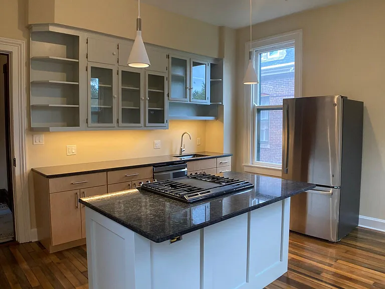 Kitchen 15.5 x 14.5. Three large windows, overlooks back yard