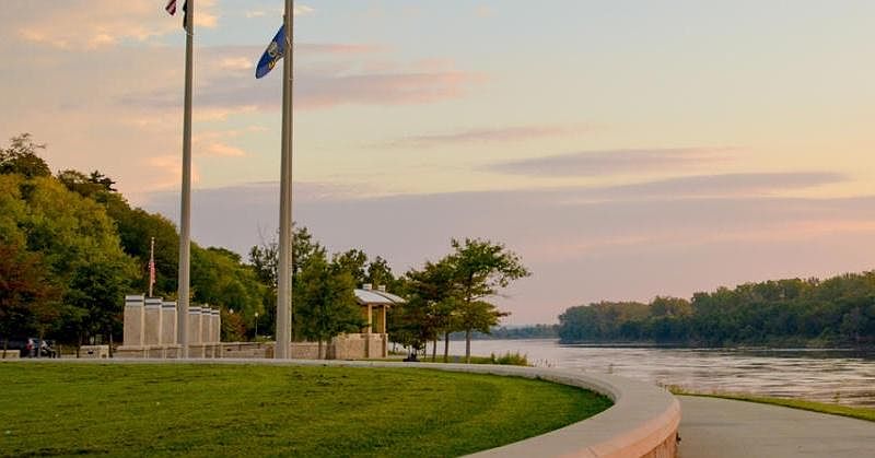 riverfront park area with trail at end of block, no excuse not to get your steps!