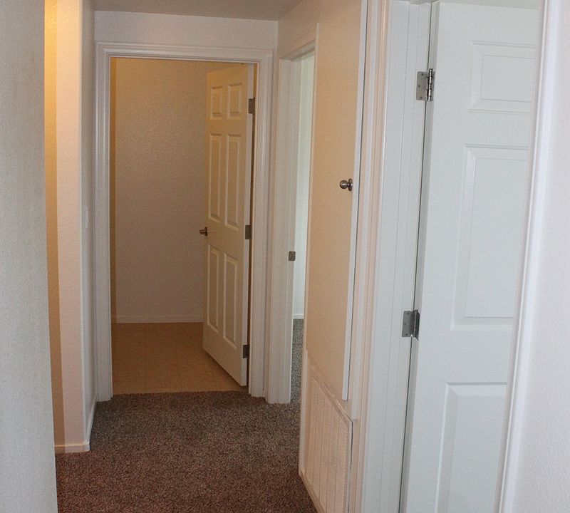 HALLWAY TO BEDRMS & LAUNDRY