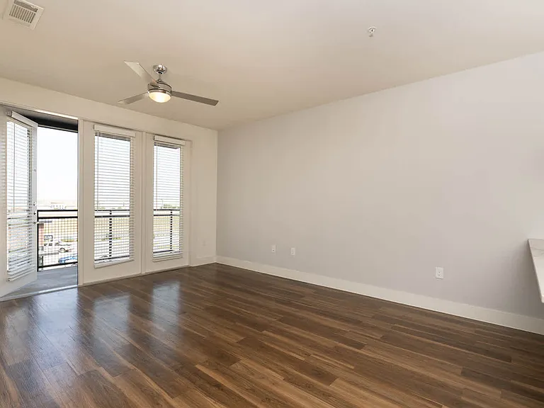 Living Room with Balcony and Hard Surface Flooring