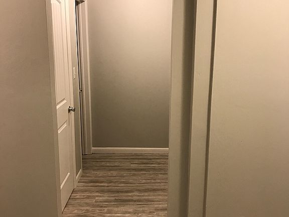 Looking through hallway to bathroom