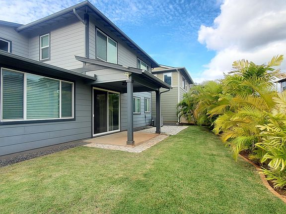 Large Corner Lot you are able to walk around the whole house (NOT zero lot or the house does NOT sit on one side of the yard). Private Yard Fully Fenced w/ Areca Palms to provide privacy.