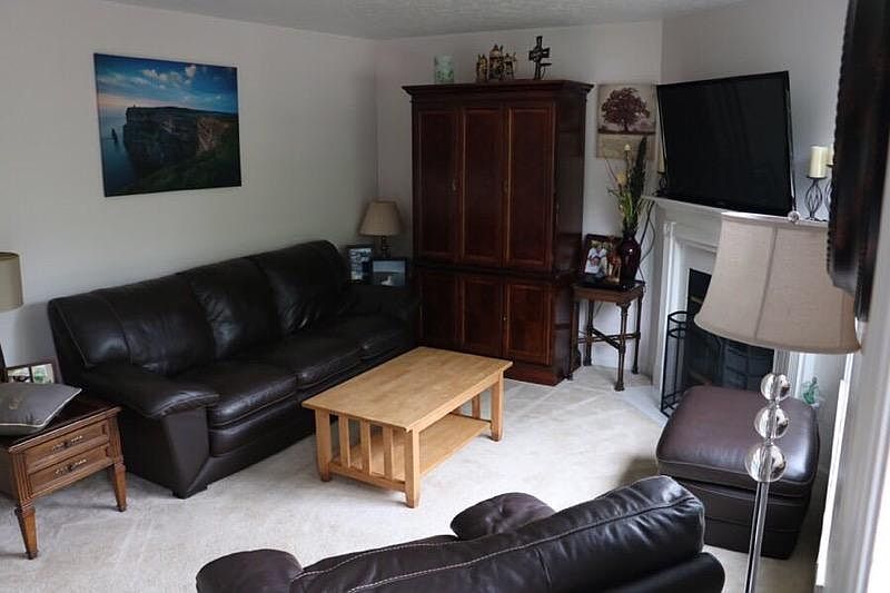 Living room with gas firepla