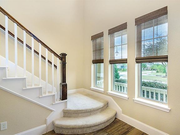 Upgraded wooden baluster staircase.