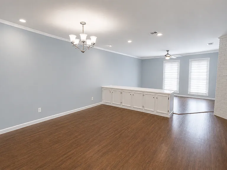 open dining/living area with gas fireplace.