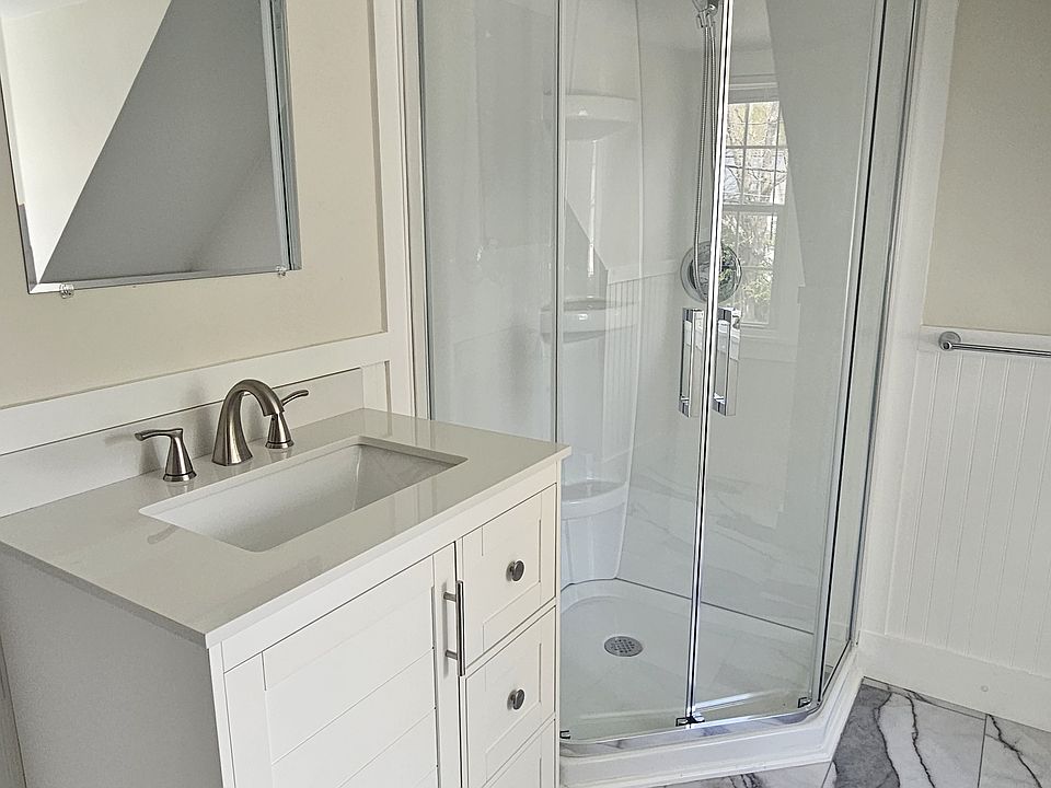 Brand new bathroom with neo-angle shower