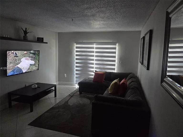 4265 NW South Tamiami Canal Dr #1-208 — Photo 5
