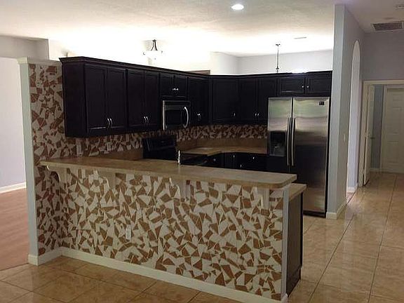4th image of 709 NW North Macedo Blvd