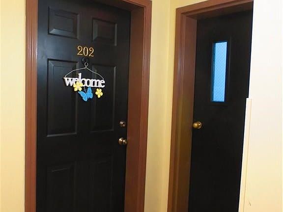 Unit 202 - Adjacent to side exit/entrance for easy access to parking!
