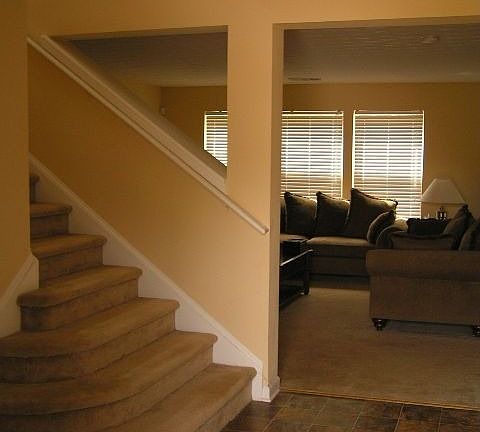 Dramatic foyer that leads into the family room