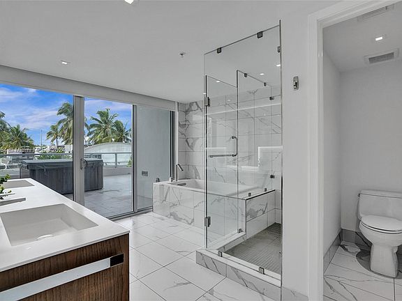 5th image of 9521 E Bay Harbor Dr Unit 301&302