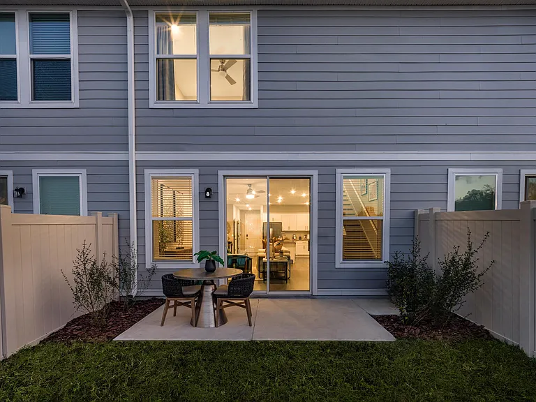 Amavi Kissimmee provides the perfect backyard featuring lush turf grass.