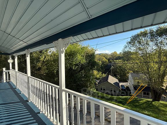 Porch with winter mountain view