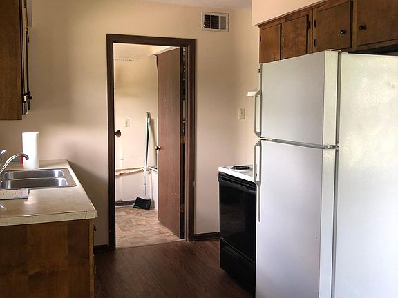Kitchen looking into Utility Room